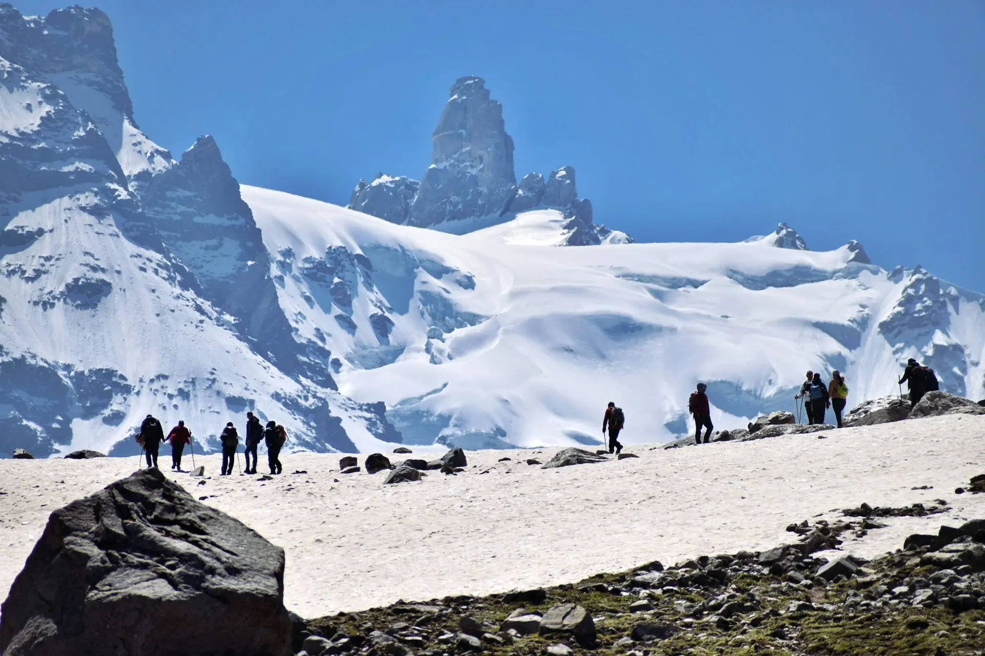 a group of people on a snowy mountain